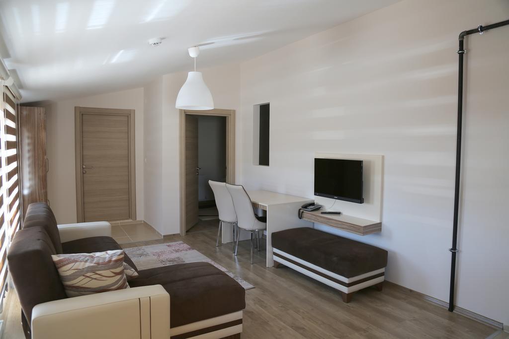 Ozsoy Apart Aparthotel Ürgüp Rum bild