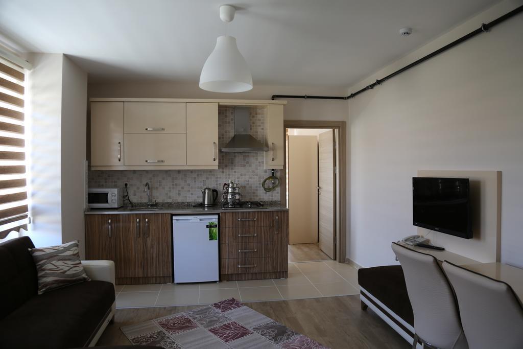 Ozsoy Apart Aparthotel Ürgüp Rum bild
