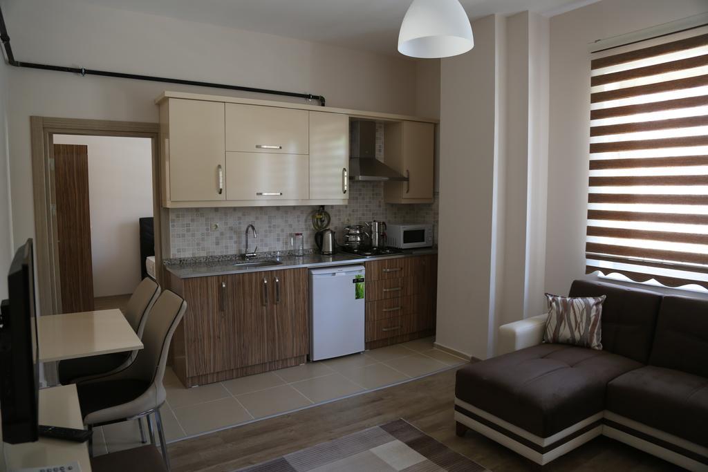 Ozsoy Apart Aparthotel Ürgüp Rum bild