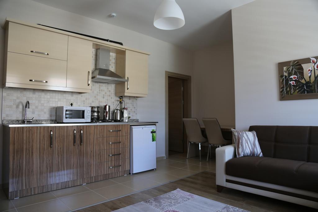 Ozsoy Apart Aparthotel Ürgüp Rum bild